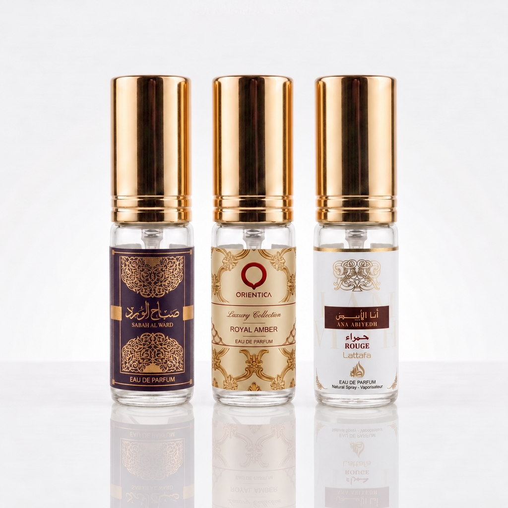 Três decants de 5ml do combo Samadi com Sabah Al Ward, Royal Amber e Ana Abiyedh Rouge, em frascos pequenos com tampa dourada