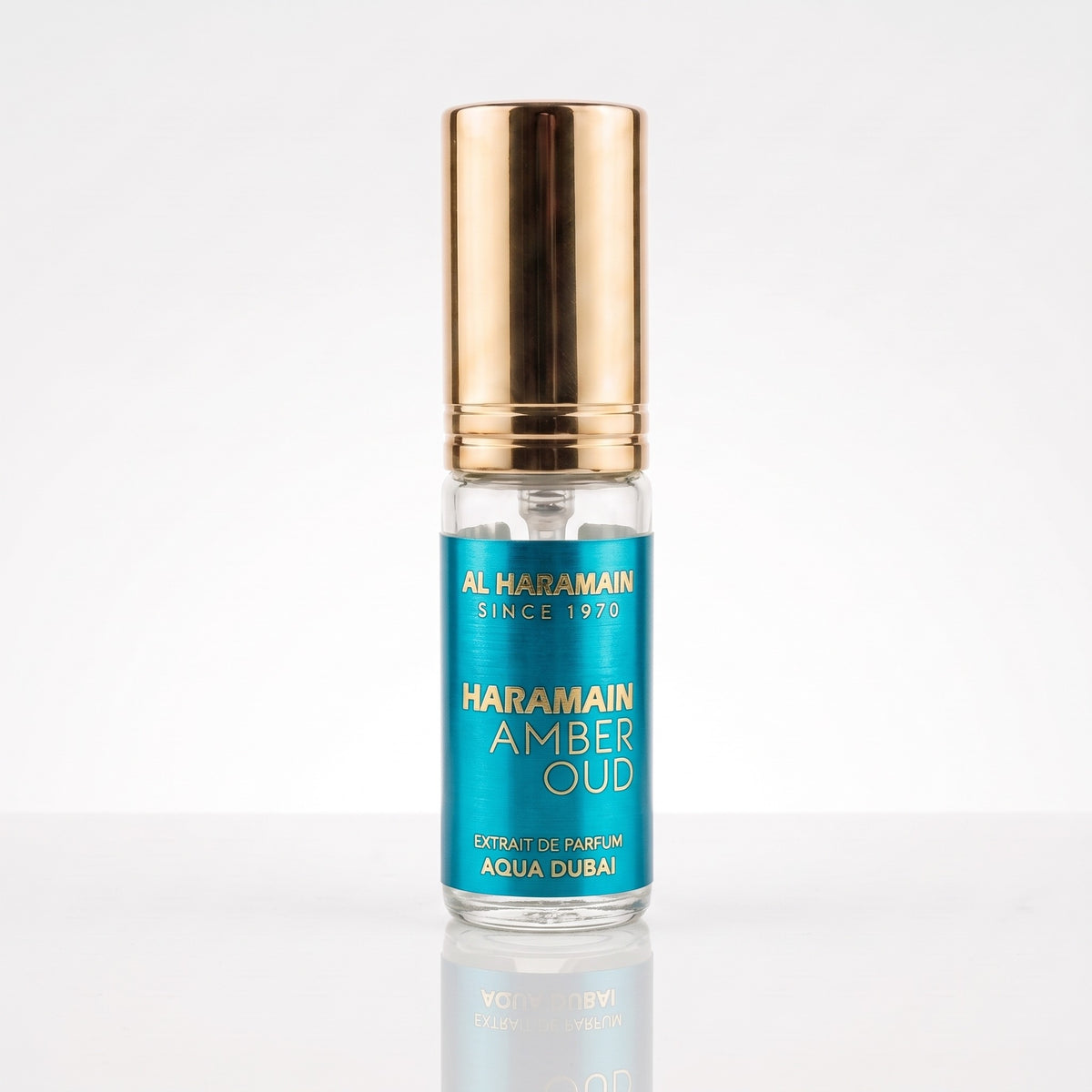 Decant físico Al Haramain Amber Oud Aqua Dubai Extrait de Parfum em frasco spray de vidro e tampa dourada