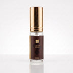 Decant de French Avenue Liquid Brun EDP em frasco transparente com tampa dourada