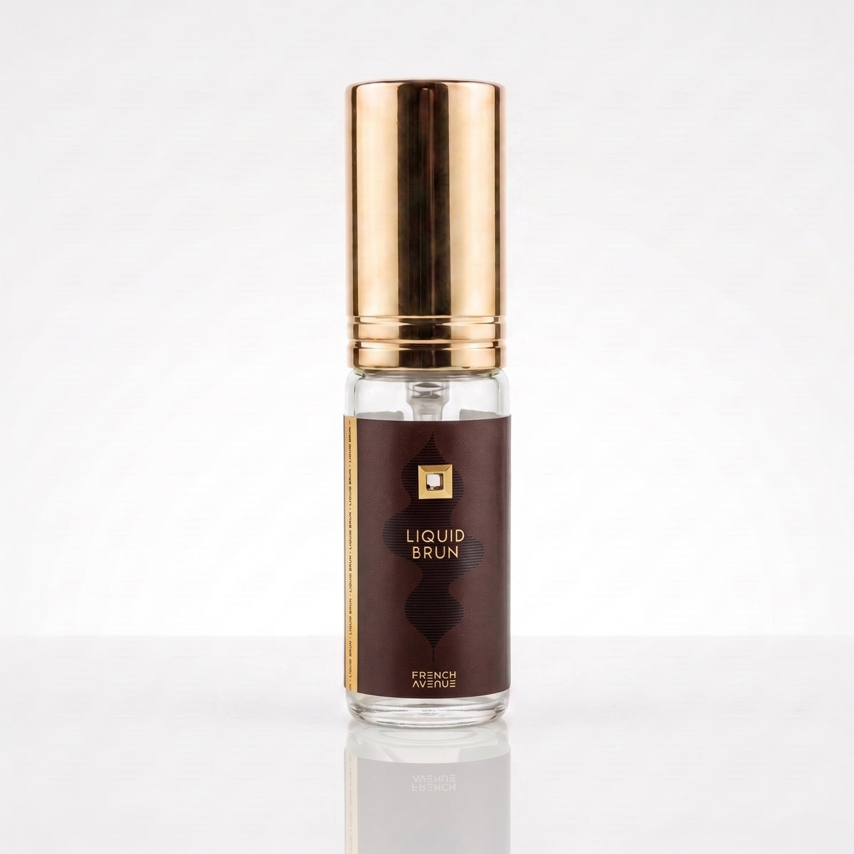 Decant de French Avenue Liquid Brun EDP em frasco transparente com tampa dourada