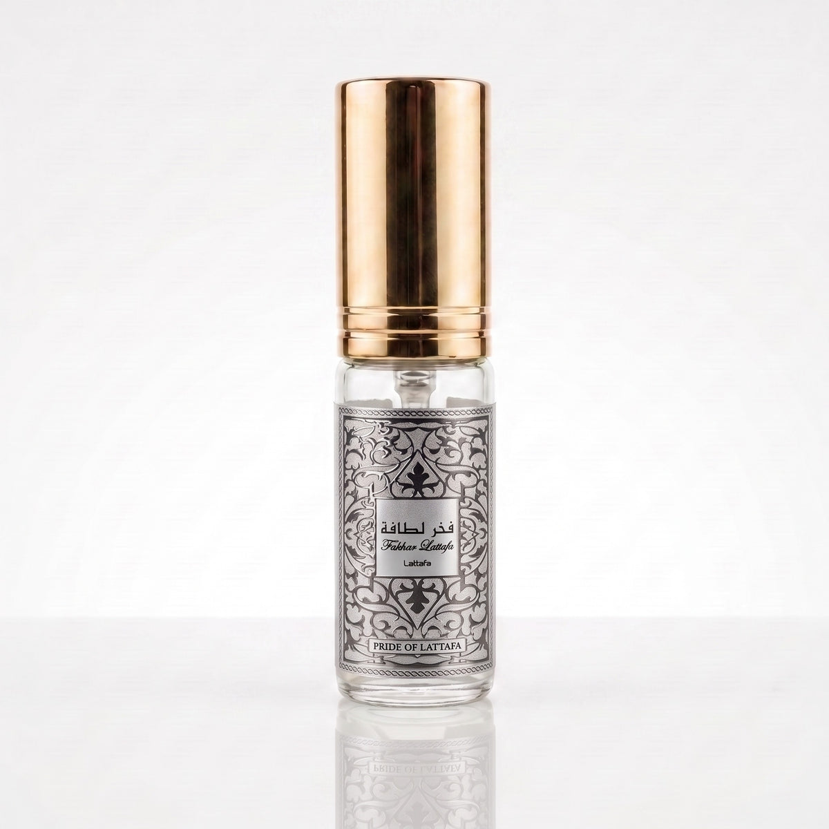 Decant físico do perfume Fakhar Platin Lattafa em frasco transparente com spray e tampa dourada