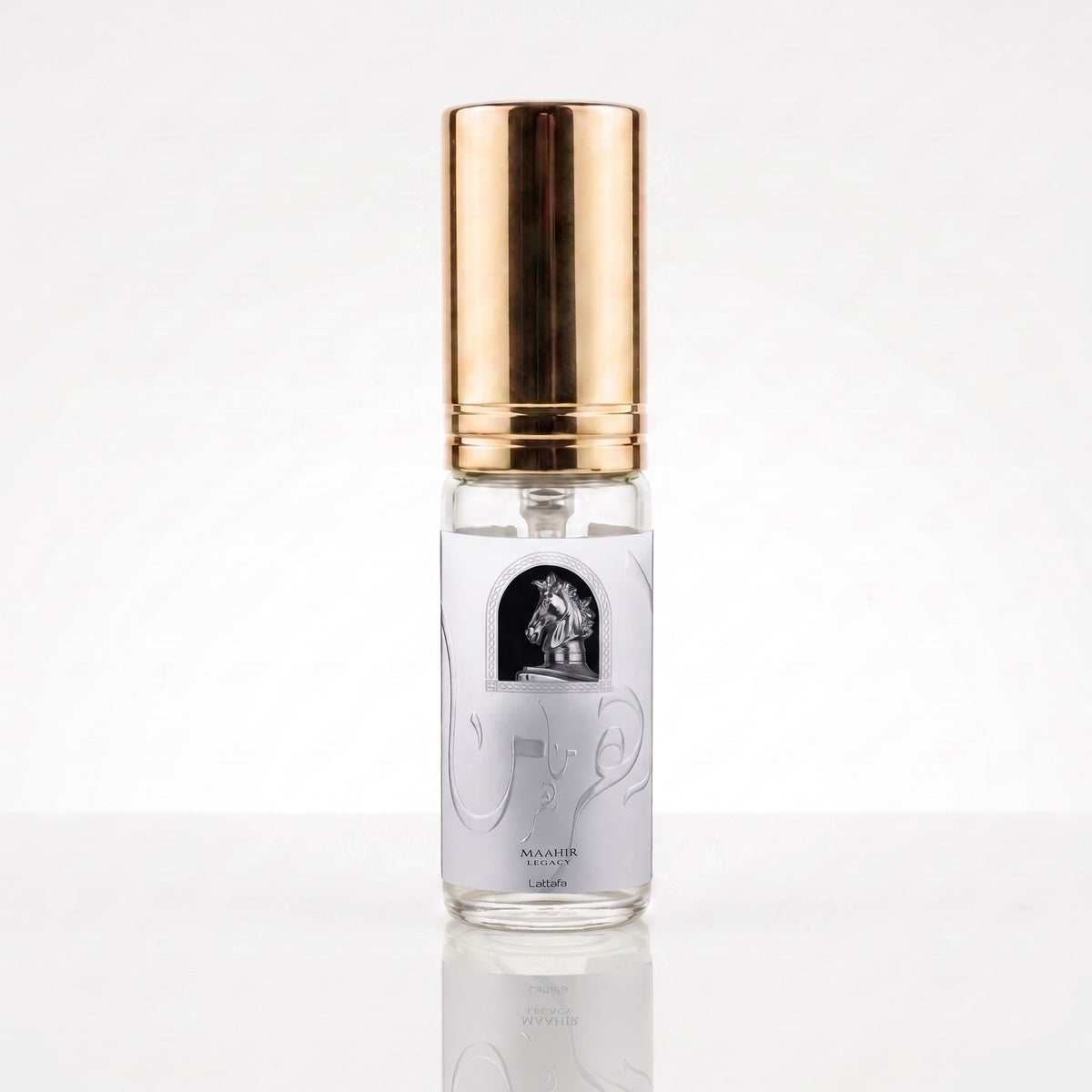 Decant de Lattafa Maahir Legacy EDP masculino em frasco transparente com tampa dourada