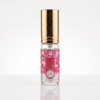 Decant de Lattafa Yara Candy EDP feminino em frasco transparente com tampa dourada
