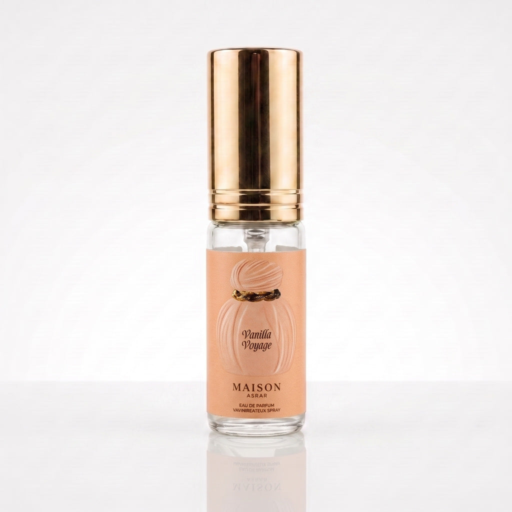 Decant de Maison Asrar Vanilla Voyage EDP em frasco transparente com tampa dourada