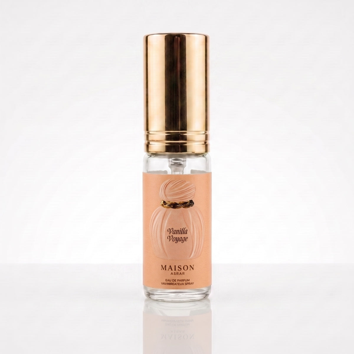 Decant de Maison Asrar Vanilla Voyage EDP em frasco transparente com tampa dourada