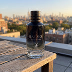 Perfume Maison Alhambra Salvo em rooftop com luz dourada de fim de tarde