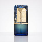 Frasco original Al Nashama Caprice Lattafa EDP 100ml azul e dourado